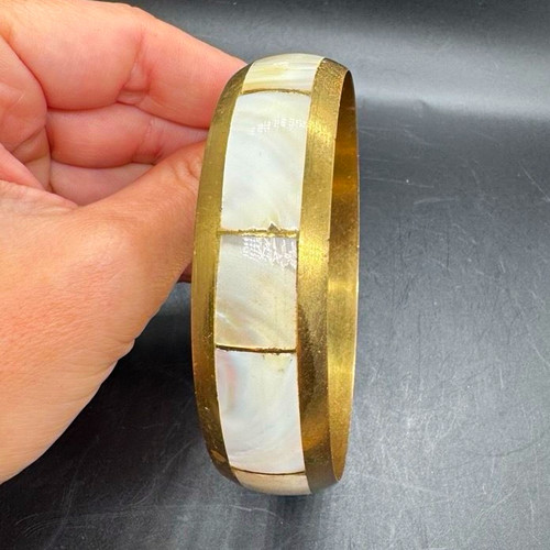 Gold tone bangle - tone,